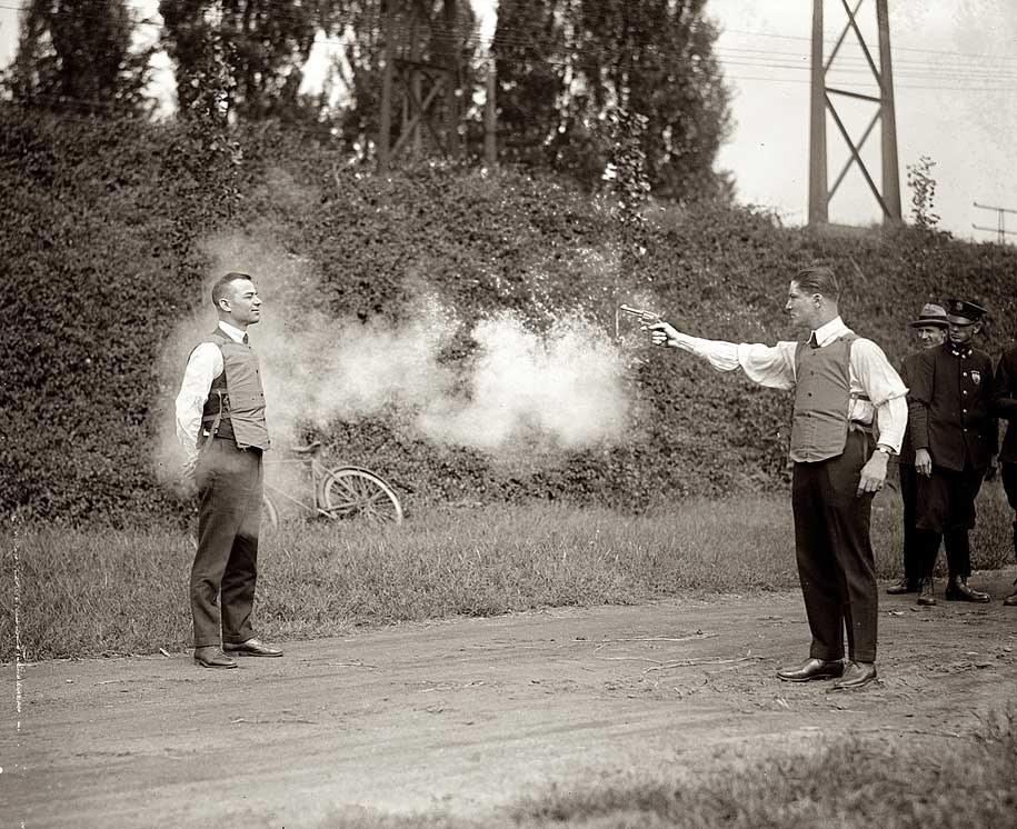 http://www.mobgenic.com/wp-content/uploads/2013/10/W.H.-Murphy-and-his-Associate-Demonstrating-their-Bulletproof-Vest-on-October-13-1923-BW.jpg